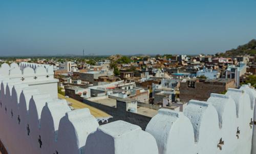 a view of a city from the top of a building at The Rawla Narlai - A Luxury Heritage Stay in Leopard Country in Nārlāi