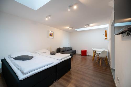 Ένα ή περισσότερα κρεβάτια σε δωμάτιο στο Pixel Guesthouse