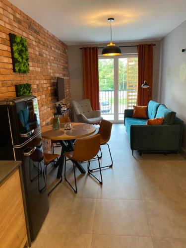 Posezení v ubytování Apartament Mech & Paprocie