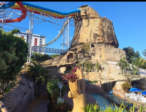 a roller coaster at the theme park at SPAZZIO DI ROMA INCLUSO ACQUA PARK SPLASH in Caldas Novas