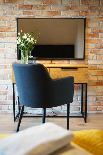 TV a/nebo společenská místnost v ubytování Resort Mielenko