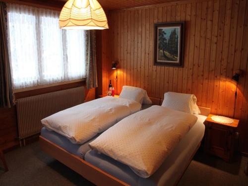 Un ou plusieurs lits dans un hébergement de l'établissement Haus Bel-Air