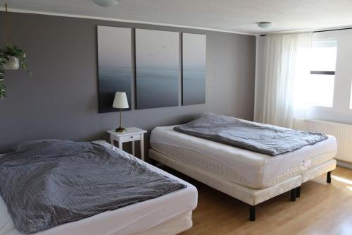 Postel nebo postele na pokoji v ubytování Lovely fully equipped apartment with free parking