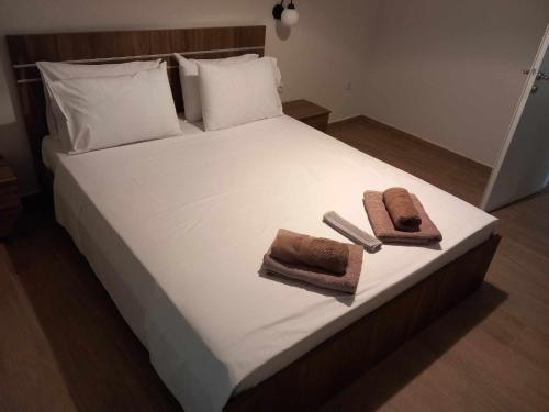 A bed or beds in a room at SPiROS HOME