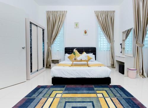 Katil atau katil-katil dalam bilik di Desaru 16Pax Family with Private Mini Pool & Jacuzzi