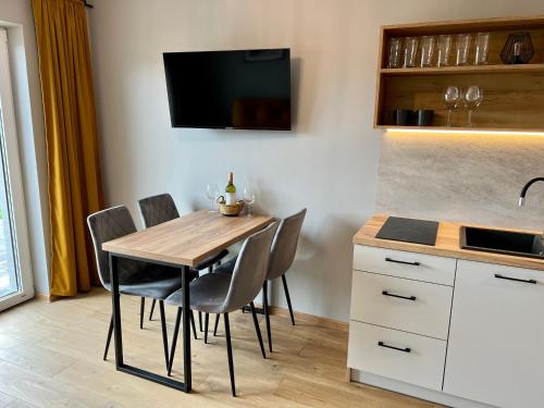 Kuchnia lub aneks kuchenny w obiekcie Jaśminowa Park