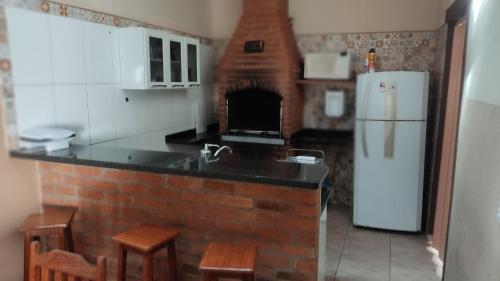 Η κουζίνα ή μικρή κουζίνα στο Casa Malaman c/ área de lazer