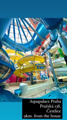 a view of a water slide at a amusement park at Byt apartman 2rooms 76m2 all new in Prague