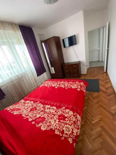 Ένα ή περισσότερα κρεβάτια σε δωμάτιο στο ApartHotel Cetate Alba Iulia