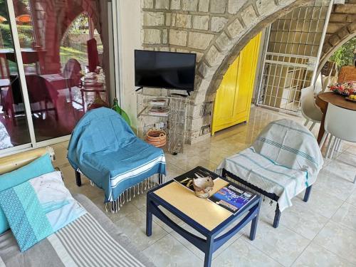 Villa calme grand jardin bord de mer. Parking photo 6