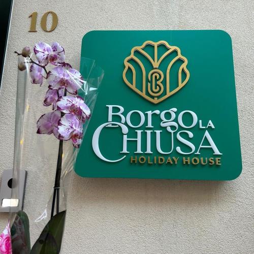 Certificado, premio, señal o documento que está expuesto en Borgo La Chiusa