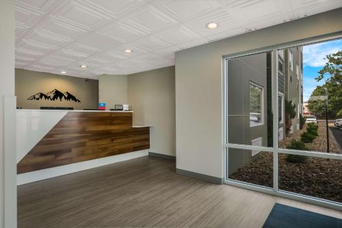 a room with a view of a building at SureStay Plus Hotel by Best Western Sevierville in Sevierville