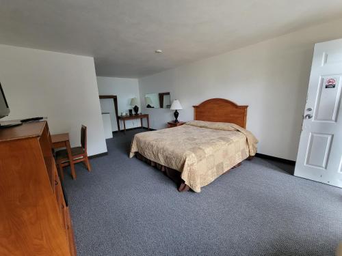 Postel nebo postele na pokoji v ubytování Stellar Motel