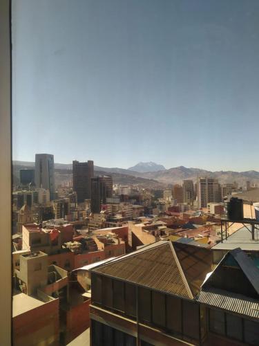 a view of the city from the roof of a building at Seven and Seven B&B in La Paz