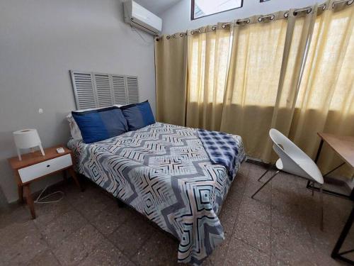 A bed or beds in a room at 1Brm Apartment few steps to Malls