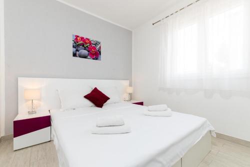 Posteľ alebo postele v izbe v ubytovaní Apartment Mavarstica 17803d