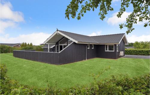 a house with a large lawn in front of it at Lovely Home In Haderslev With Sauna in Haderslev