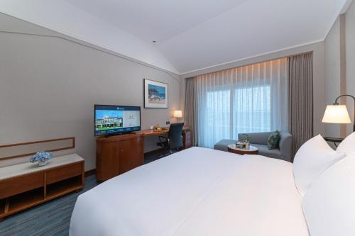 Katil atau katil-katil dalam bilik di Xiamen Xiang An Yi Hao Hotel