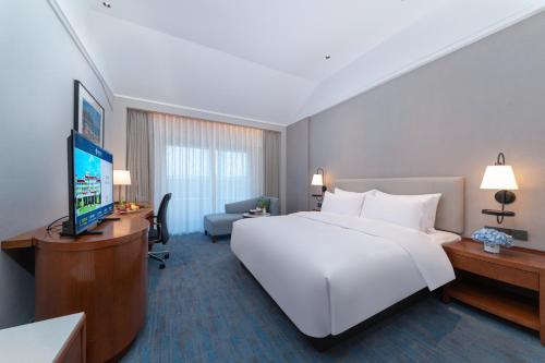 Televisyen dan/atau pusat hiburan di Xiamen Xiang An Yi Hao Hotel