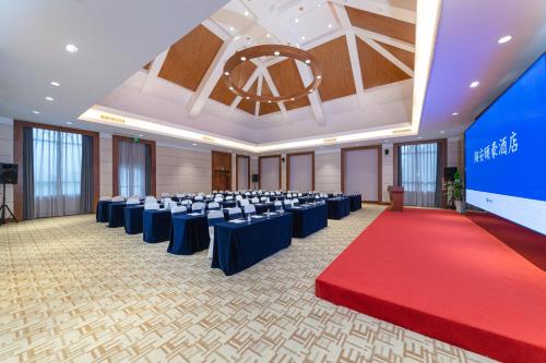 Kawasan bisnes dan/atau bilik persidangan di Xiamen Xiang An Yi Hao Hotel