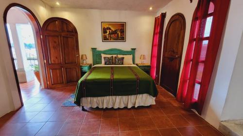 Ένα ή περισσότερα κρεβάτια σε δωμάτιο στο Casa Miranda