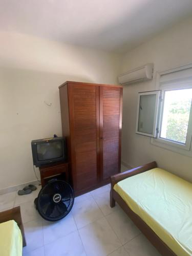 Ένα ή περισσότερα κρεβάτια σε δωμάτιο στο Chalet Marina Alamein first row sea view 3 bedroom-North Coast