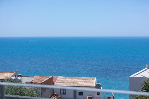 a view of the ocean from a balcony at Casa vacanza lido in Sciacca
