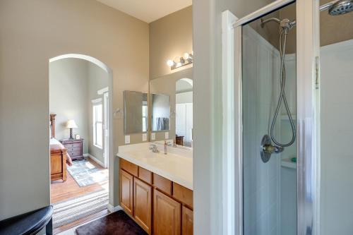 a bathroom with a sink and a shower at Las Vegas Vacation Rental with Pool Access in Las Vegas