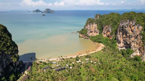 a view of a beach with rocks and the ocean at Tinidee Hideaway Tonsai Beach Krabi - SHA Extra Plus in Tonsai Beach