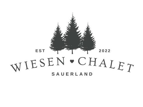 a logo for the westen chalet savage island at Ferienhaus Wiesenchalet im Sauerland in Schalksmühle
