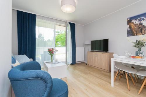 Televisyen dan/atau pusat hiburan di APARTAMENTY MIERZEJA - Stegna Forest, blisko lasu, Bezpłatny Meleks