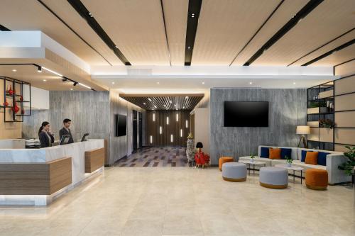 Lobbyen eller receptionen på PARKROYAL Suites Bangkok - SHA Plus Certified
