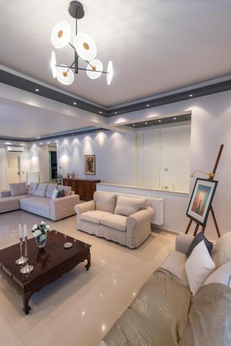Χώρος καθιστικού στο Villa Moonstone