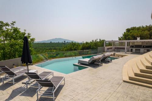 Πισίνα στο ή κοντά στο Villa Moonstone