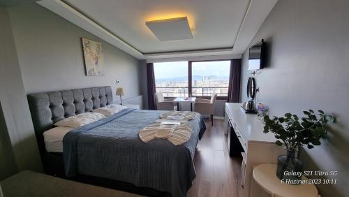 Postel nebo postele na pokoji v ubytování VESTA RESORT BUTİK HOTEL