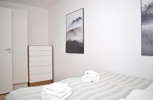 Кровать или кровати в номере Apartments Lund
