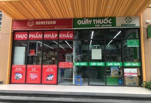 a store front of a pharmacy with signs on it at Apartment 1BR-FL25th-R103 Building-Vinhomes Ocean Park in Hanoi