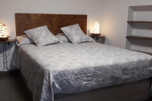 Säng eller sängar i ett rum på Dúplex Sant Martí