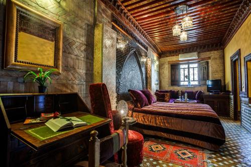Postel nebo postele na pokoji v ubytování Riad La Maison Verte