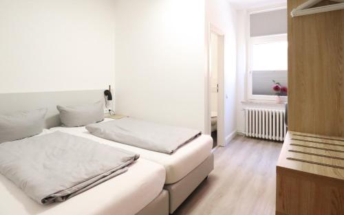 Cama o camas de una habitación en Kleine Möwe