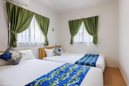 Voodi või voodid majutusasutuse BBQ可/最大8人/古宇利島車で7分/北部を満喫したい方に1番のおすすめ宿/無料駐車場3台 Mahina house toas