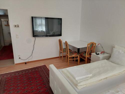 TV/Unterhaltungsangebot in der Unterkunft Weißes Appartement