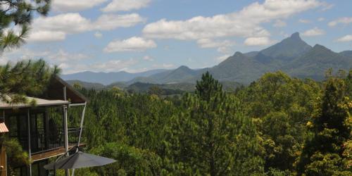 a view of the mountains from a house at EcOasis in Uki