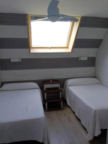 Apartamentos Viña Olivanにあるベッド