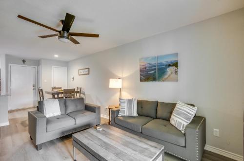 a living room with two couches and a ceiling fan at Montgomery Vacation Rental with Pool Access! in Montgomery