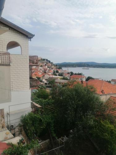 a view of the city and water from a building at Studio apartman Laca in Šibenik