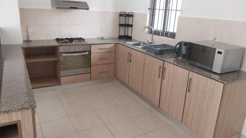 Η κουζίνα ή μικρή κουζίνα στο Villa John