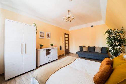 a living room with a couch and a table at Market Square - street Rynek 24 -2 Rooms in Wrocław