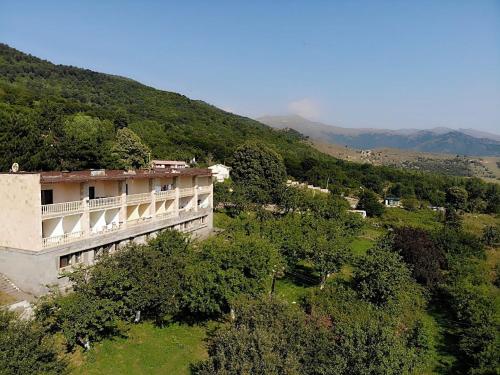 an aerial view of a building on a hill at Odzun Hotel in Alaverdi