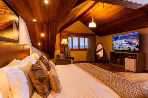 Postel nebo postele na pokoji v ubytování Bendito Cacao Resort & Spa